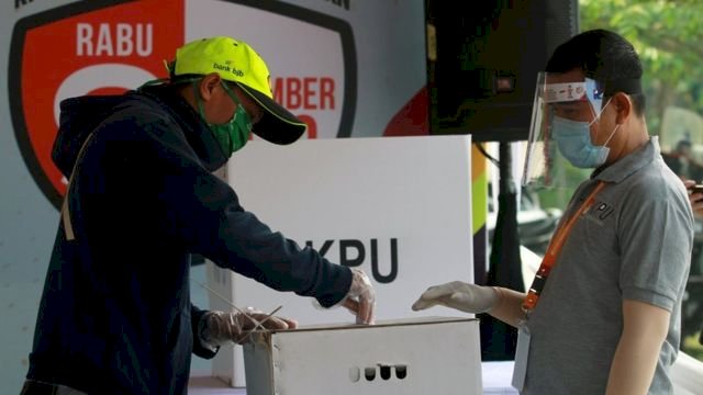 Ilustrasi: simulasi pencoblosan di TPS. (int)