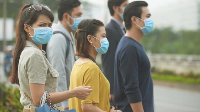 Hasil penelitian, selain memakai masker, orang juga harus bisa menjaga jarak agar terhindar dari Covid-19. (int)