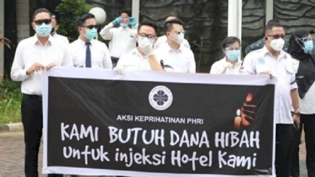 Aksi demo dari PHRI yang menuntut pencairan dana hibah dari Kemenkepraf, Rabu (3/2/2021). (int)