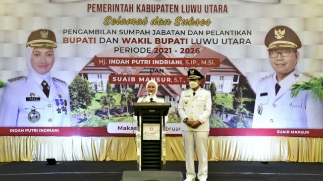 Bupati Luwu Utara Indah Putri Indriani dan Wakil Bupati Suaib Mansur saat menyampaikan pidato perdana usai dilantik di Ball Room Hotel Claro, Makassar, Jumat (26/2/2021).