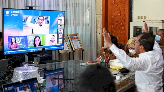 Walikota Makassar Moh Ramdhan &ldquo;Danny&rdquo; Pomanto saat menjadi pembicara pada acara pulang kampung digital yang diadakan detik network secara virtual, Selasa (4/5/2021).