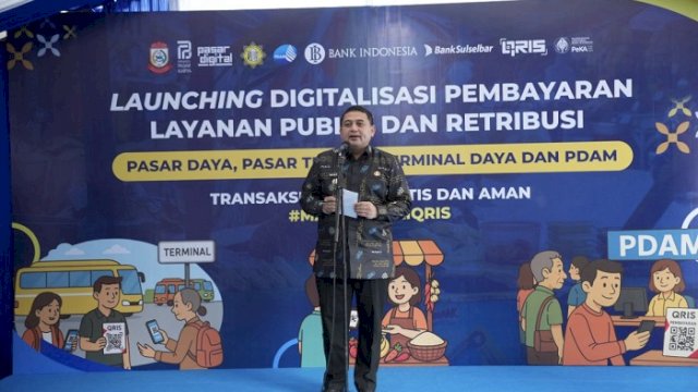 Walikota Makassar, Munafri Arifuddin saat menghadiri Launching Sistem Transaksi Digital/Non-Tunai Berbasis QRIS di Pasar Pusat Niaga Daya, Kecamatan Biringkanaya, Senin (28/7/2025).